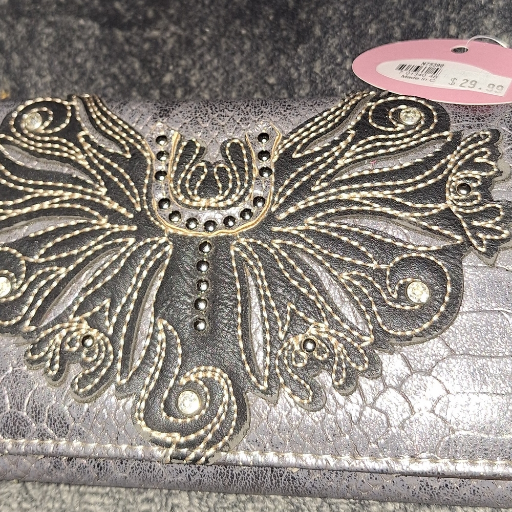 Gray and Gold Ornate Wallet with Intricate Design
